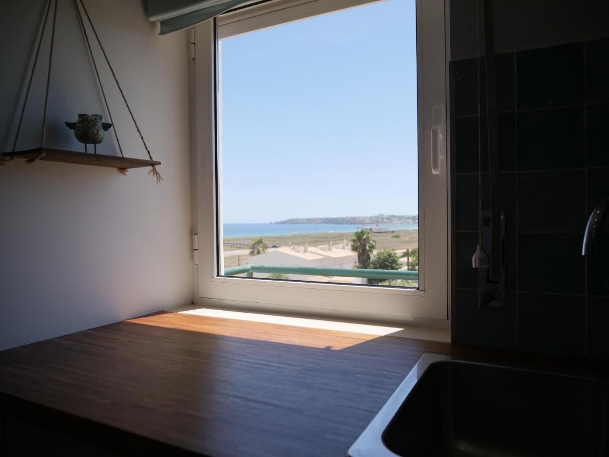 Cozy Apartment With Sea View Over Meia Praia Lagos Bagian luar foto